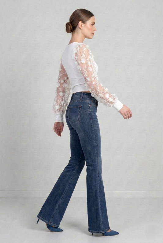 Jeans donna flare vita alta in denim blu – vista laterale pantaloni bootcut eleganti