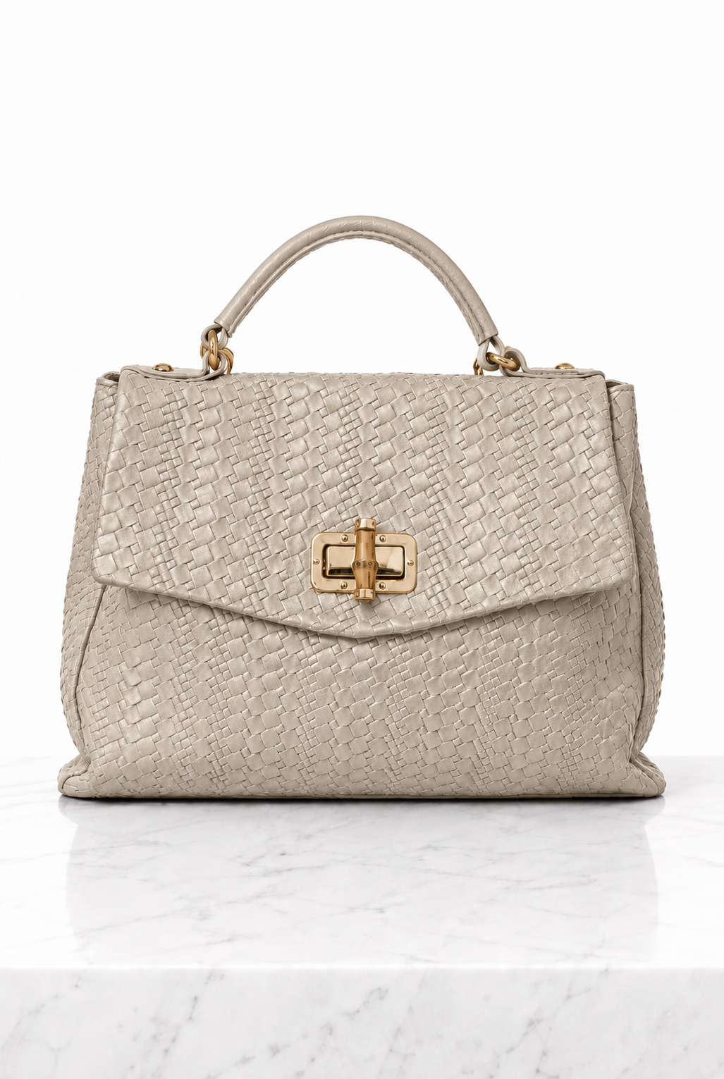 Borsa a mano donna tortora chiaro in vera pelle intrecciata con chiusura dorata