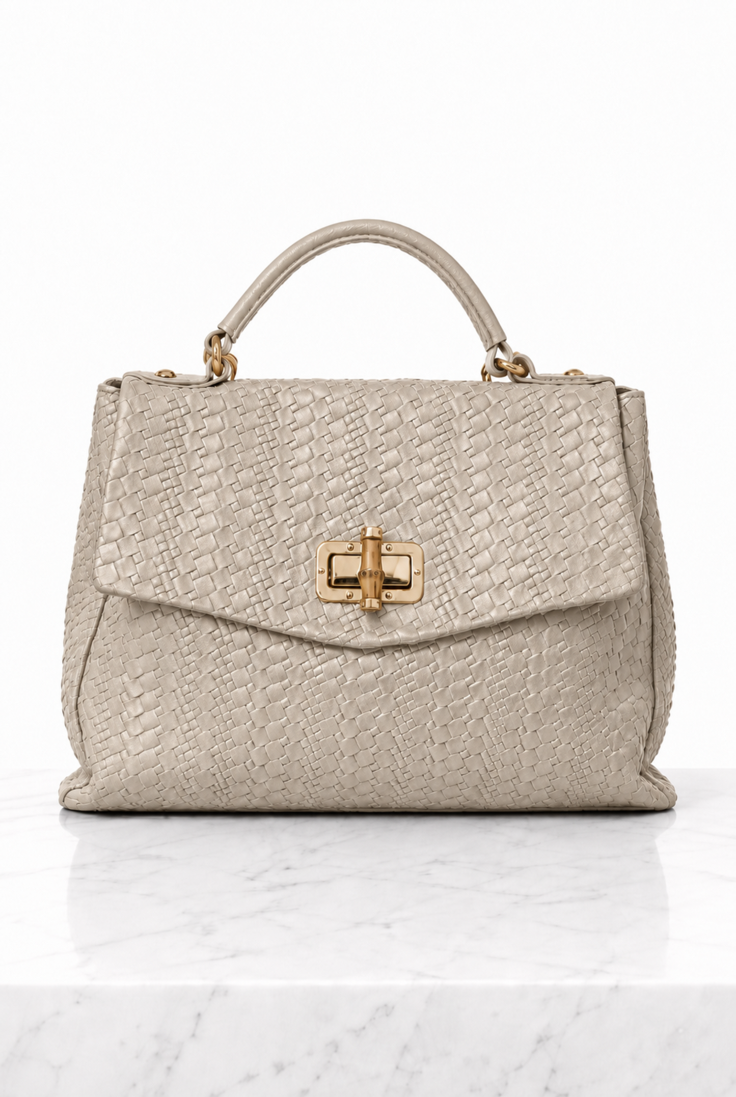 Borsa a mano donna tortora chiaro in vera pelle intrecciata con chiusura dorata