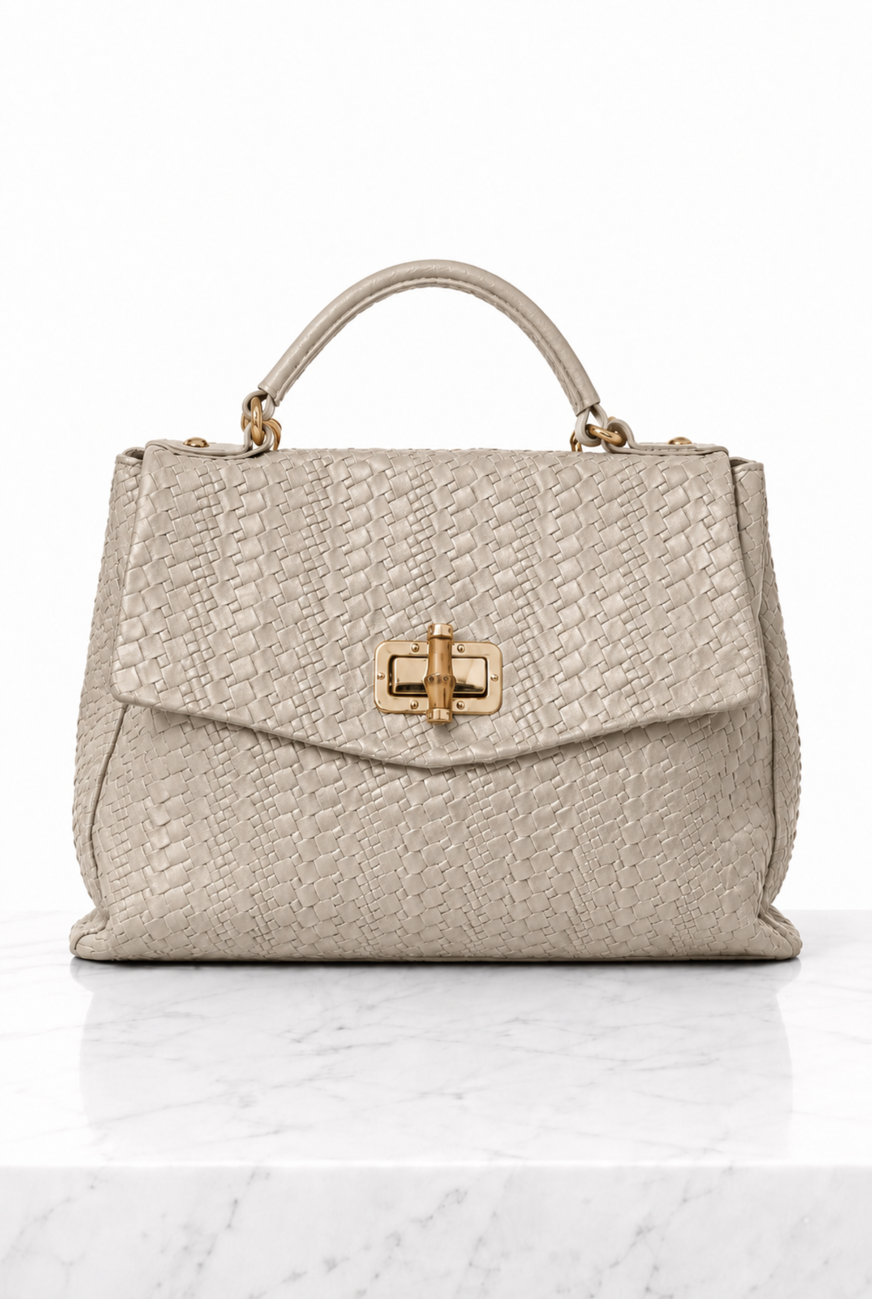 Borsa a mano donna tortora chiaro in vera pelle intrecciata con chiusura dorata