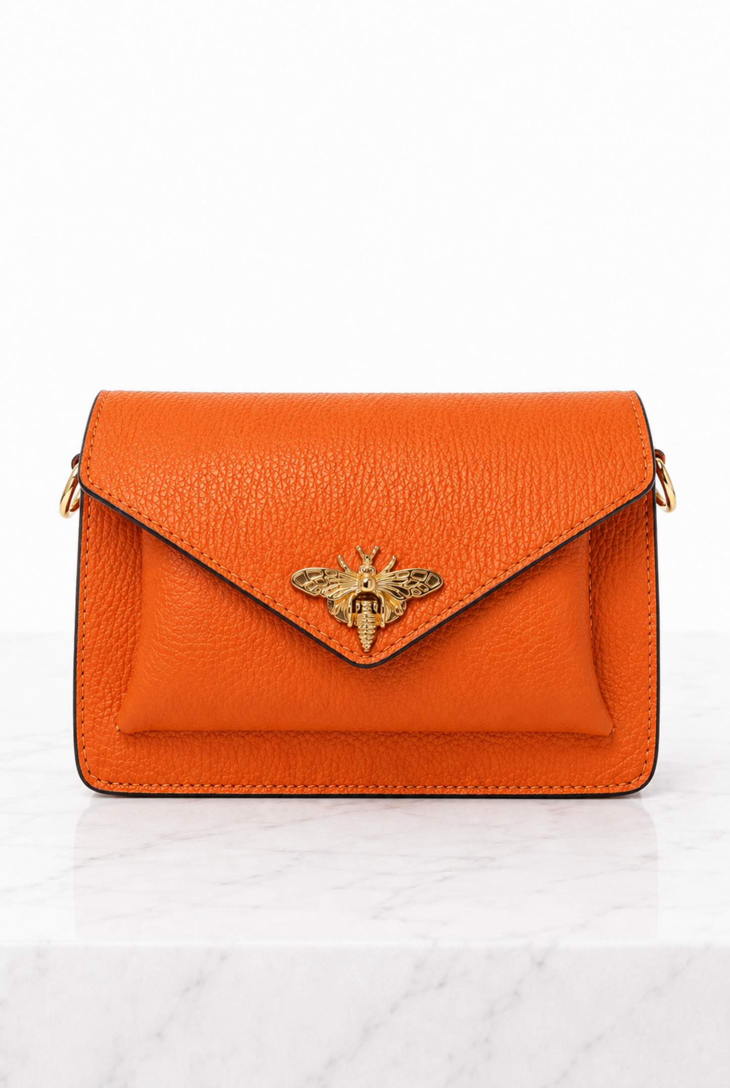 Borsa donna arancione in vera pelle martellata con ape dorata e tasca frontale