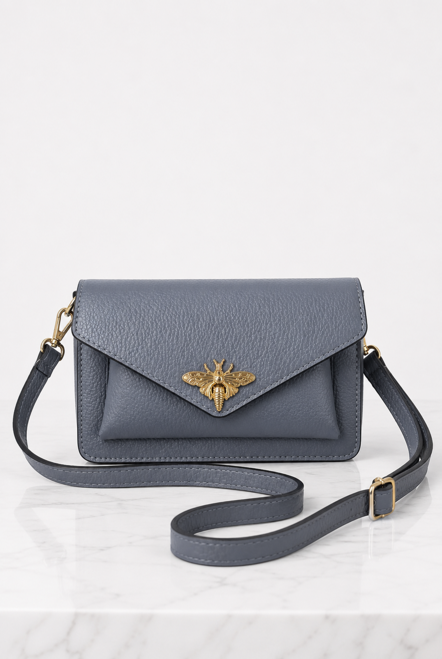 Borsa grigio azzurro in vera pelle con tracolla regolabile e staccabile