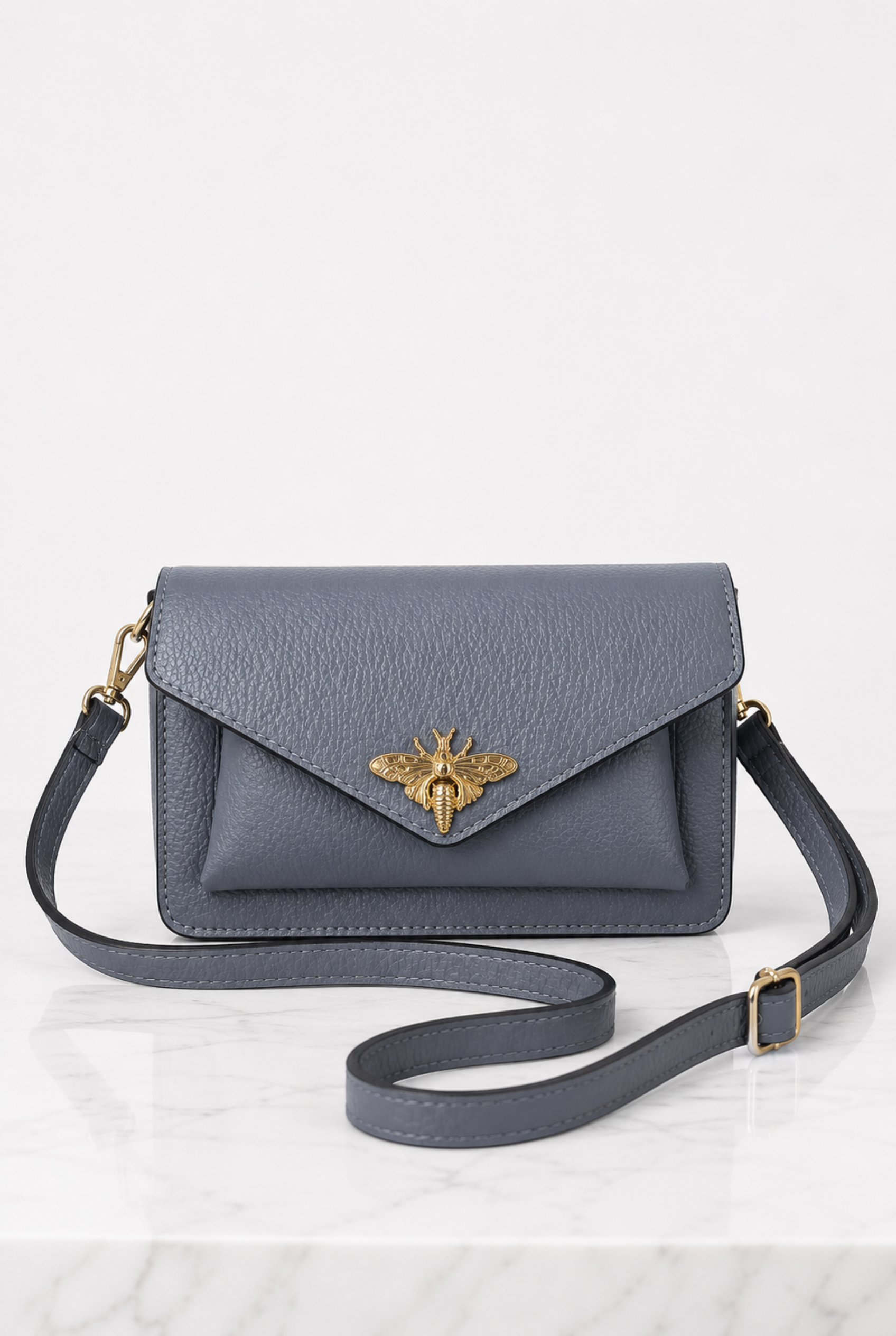 Borsa grigio azzurro in vera pelle con tracolla regolabile e staccabile
