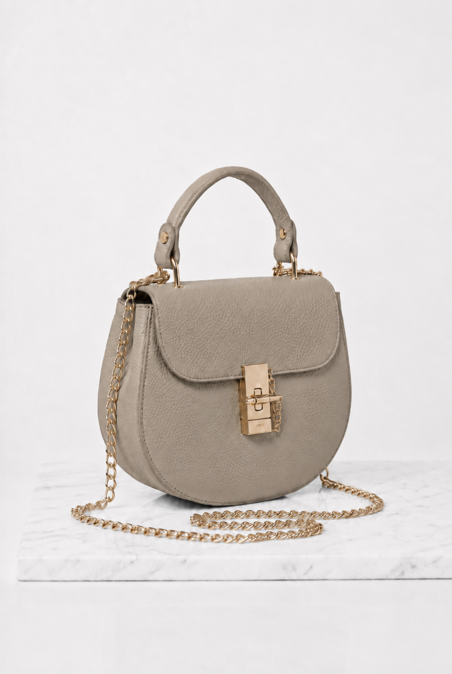 Borsa grigio tortora in vera pelle con manico e catena