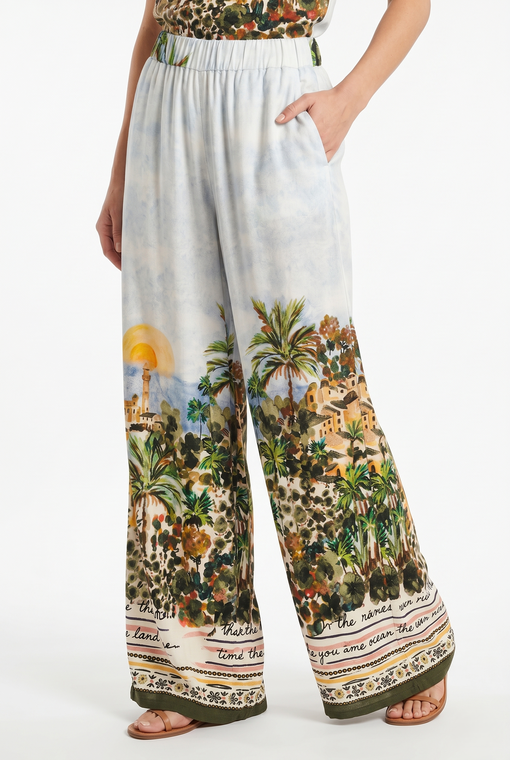 pantalone donna con tasche laterali fluido estivo con fantasia floreale mediterranea verde militare