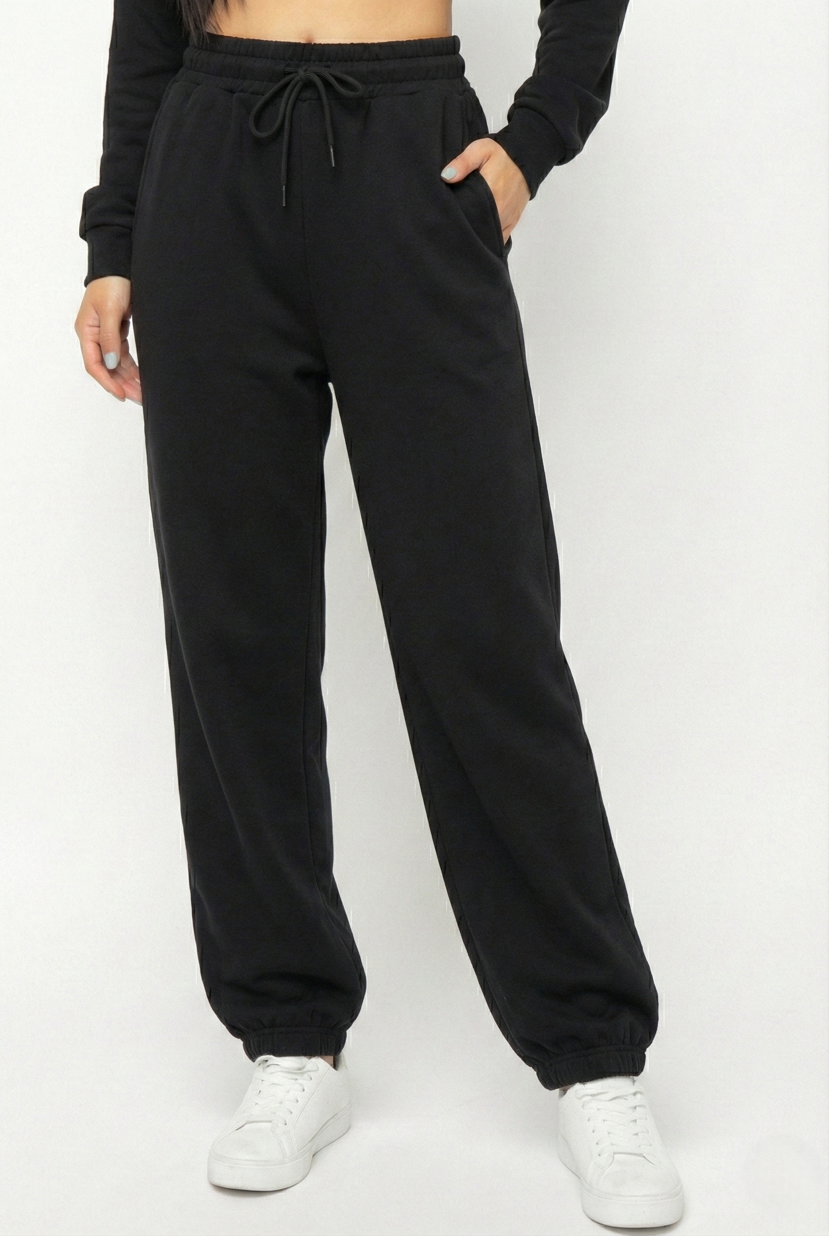 Pantaloni jogger donna neri con vita elasticizzata e coulisse