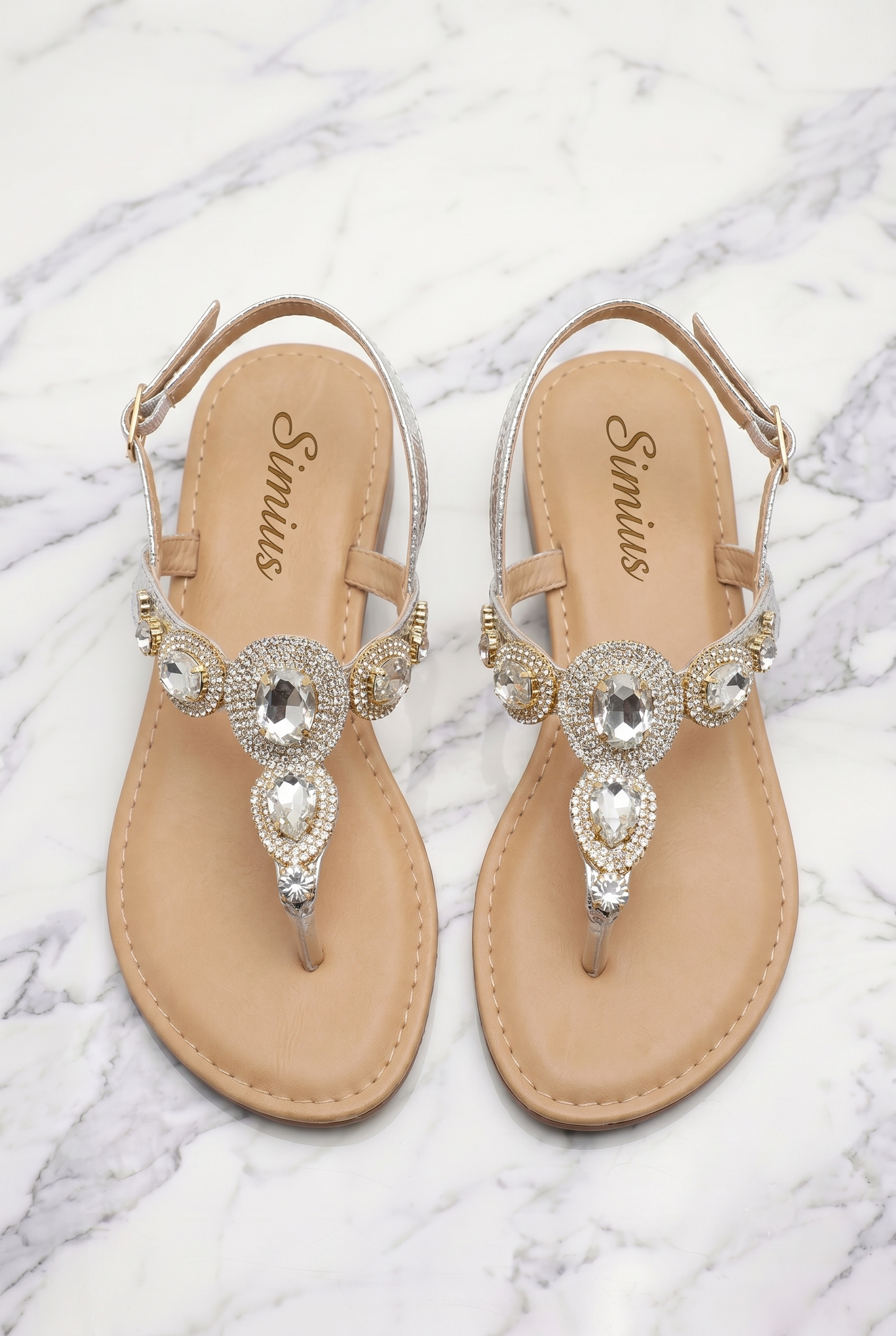 Sandali gioiello Simius argento da donna con strass e pietre luminose visti dall’alto
