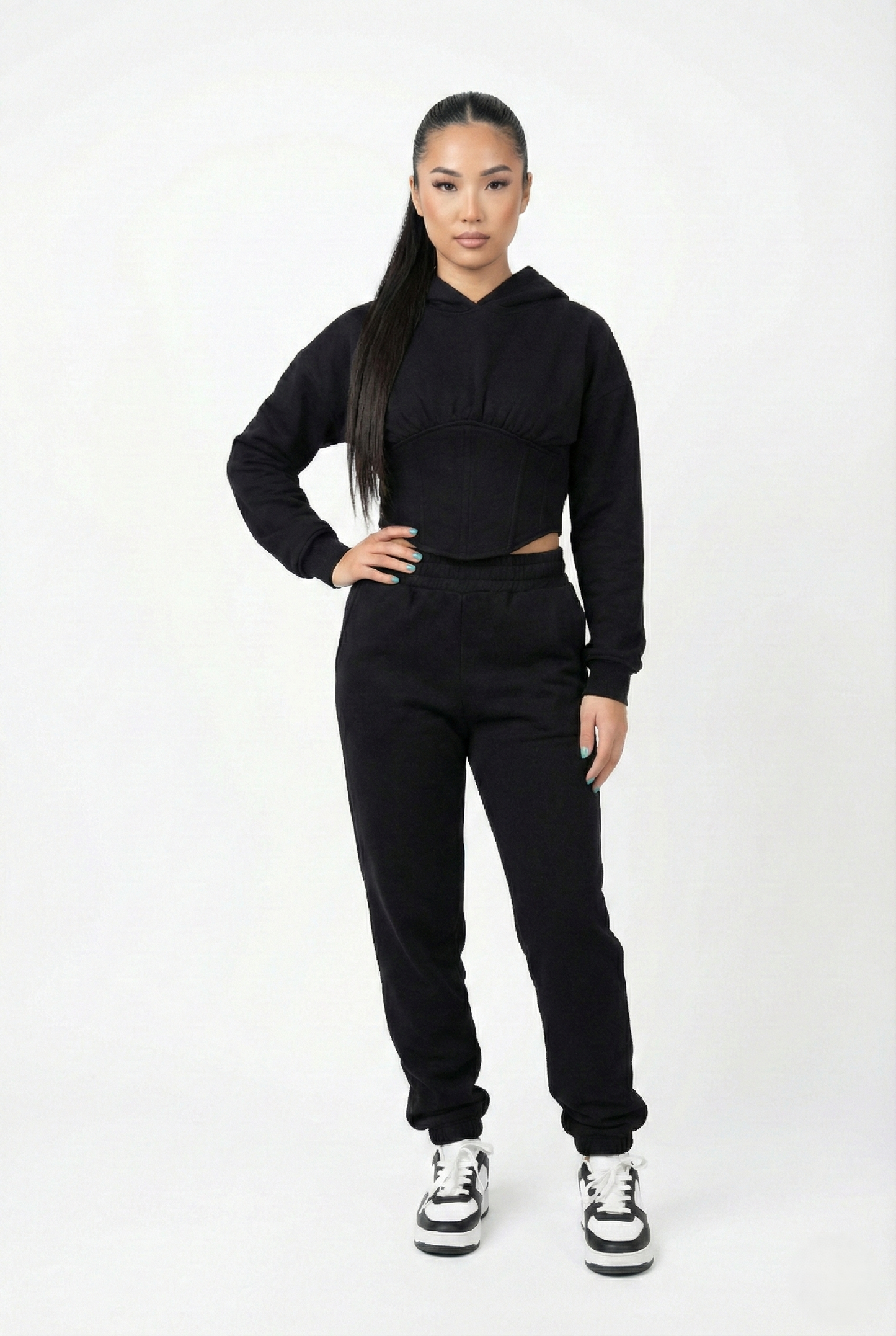 Tuta donna in cotone garzato con bustino modellante colore nero